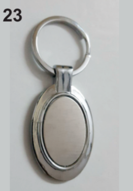 K23  keychain oval shaped. Metallic frame